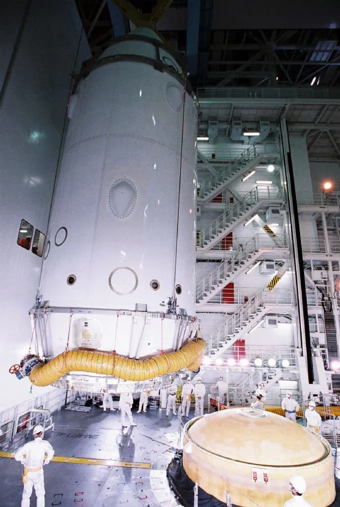 The HTV cargo vehicle is shown attached to a launch vehicle second stage.